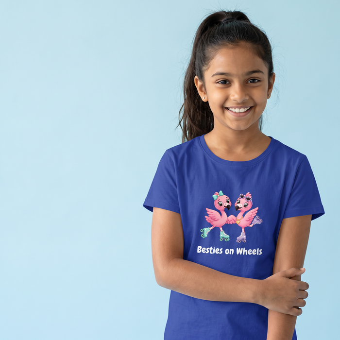 Girl smiling in the Besties On Wheels tee