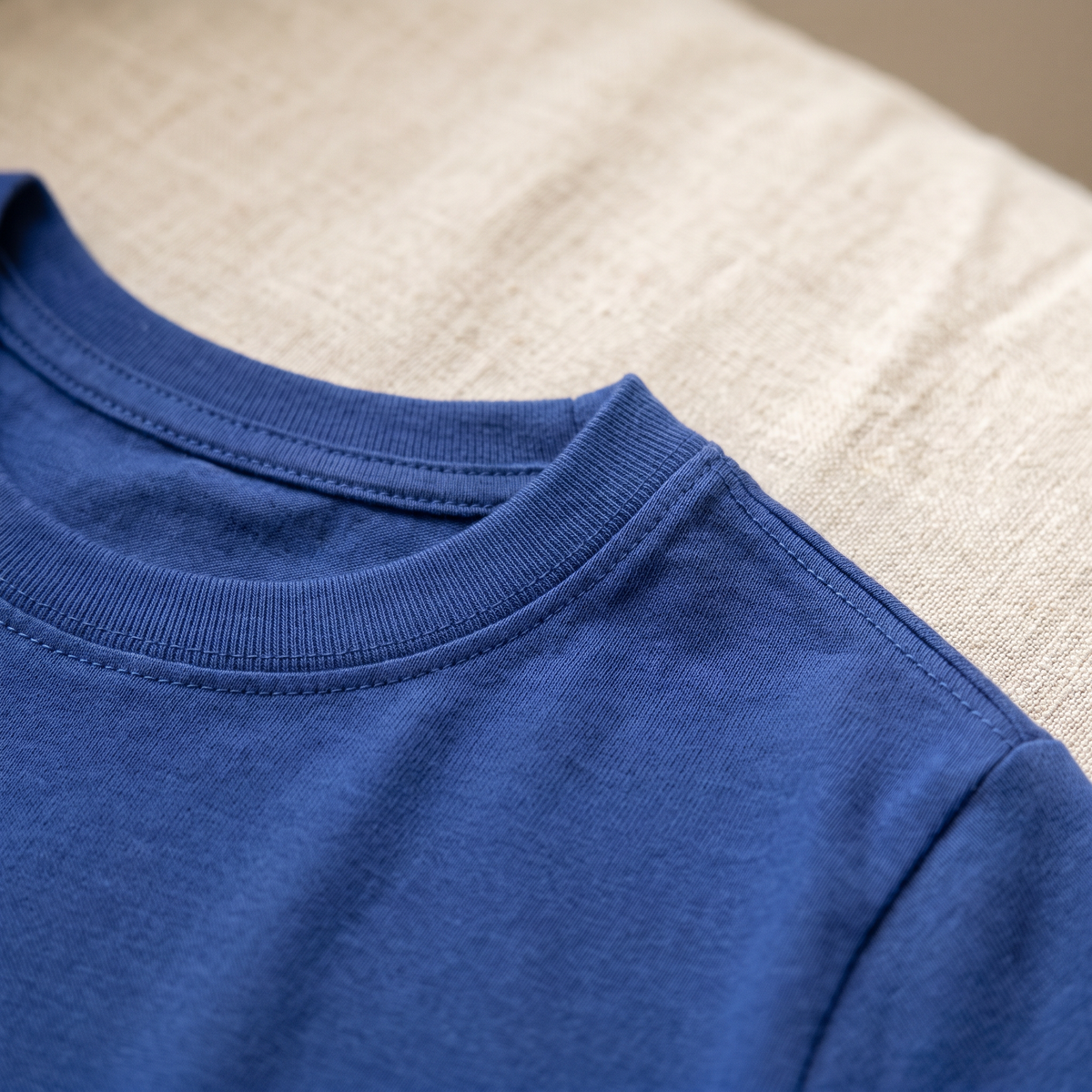 Ribbed collar and soft knit of an Alphonso tee